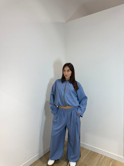 Tuta Pharrel azzurra